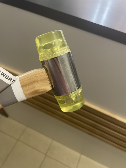 A dent-removal hammer with nylon tips (replaceable); tip diameter: 3.5 cm; beechwood handle