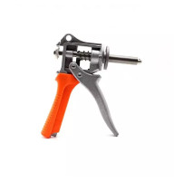 Gun for leveling process holes